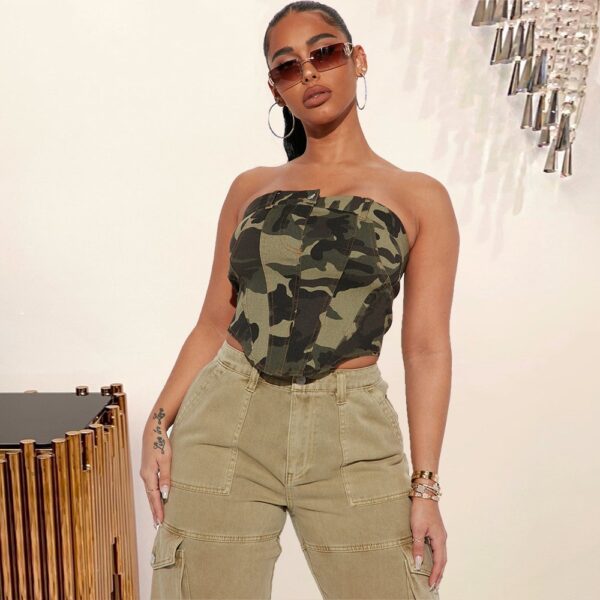 a women in a camo top and pants