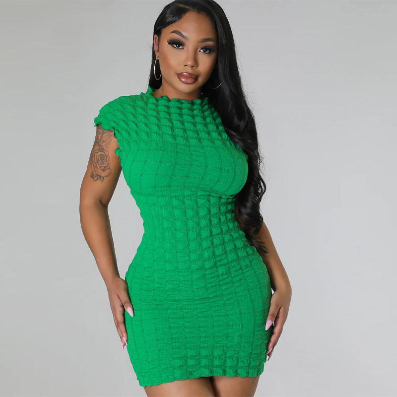 women in green short dress